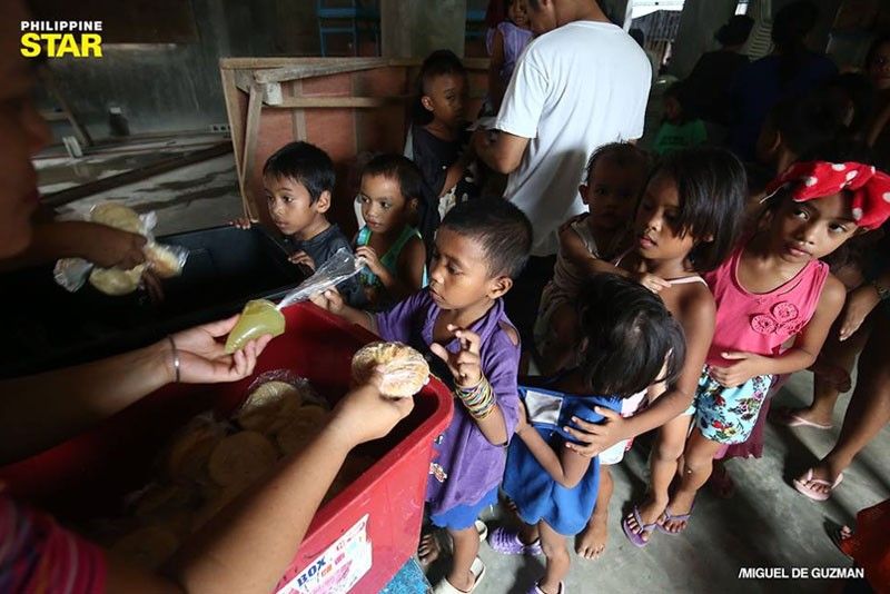 SMC puts up 1st food bank in Tondo