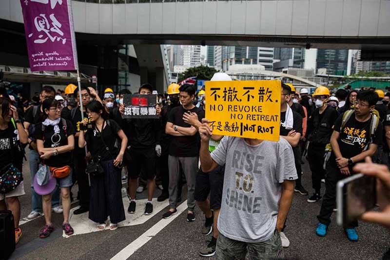 Protesters control key roads after historic Hong Kong rally