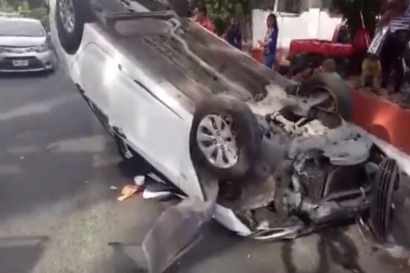 WATCH: Sleeping driverâ��s vehicle flips over after hitting island in Manila