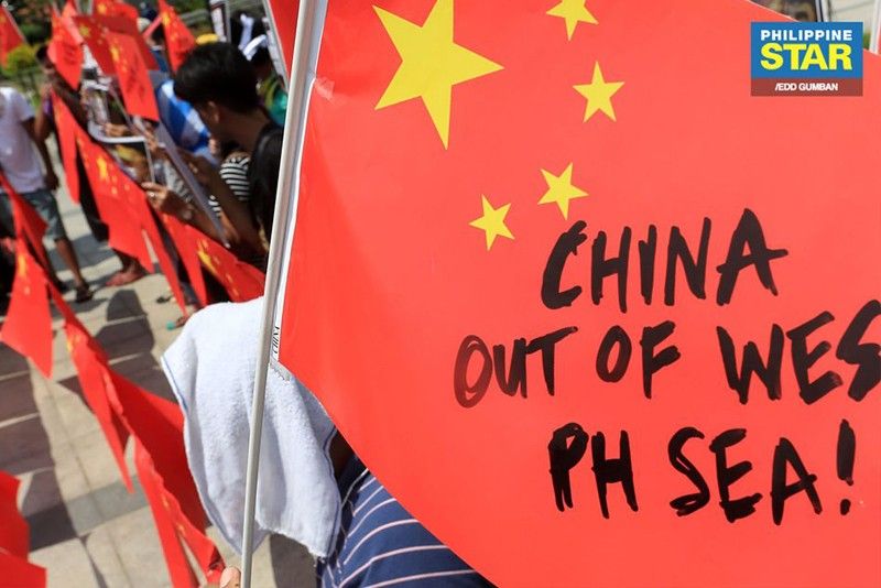 DFA chief rejects joint probe offer of China