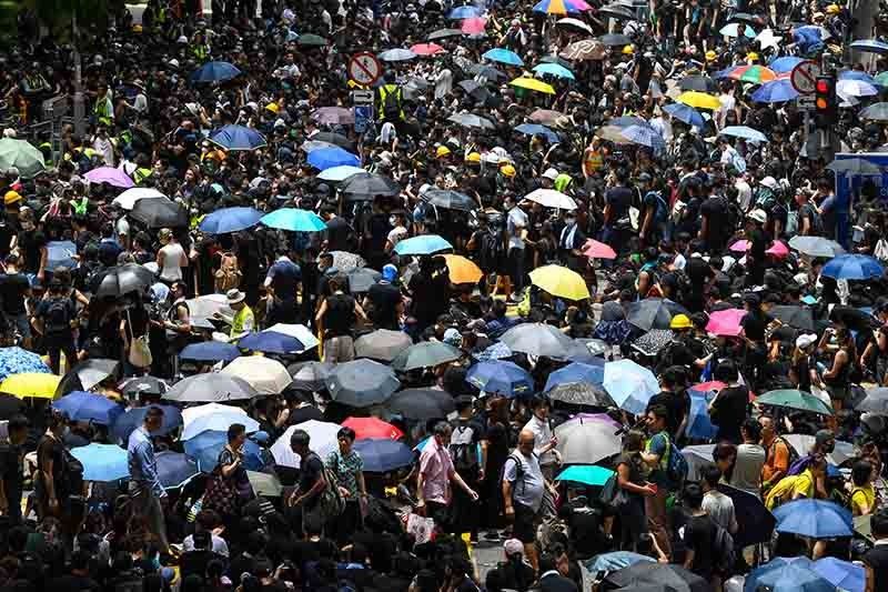 Hong Kongers emigrate as freedoms and living standards slide