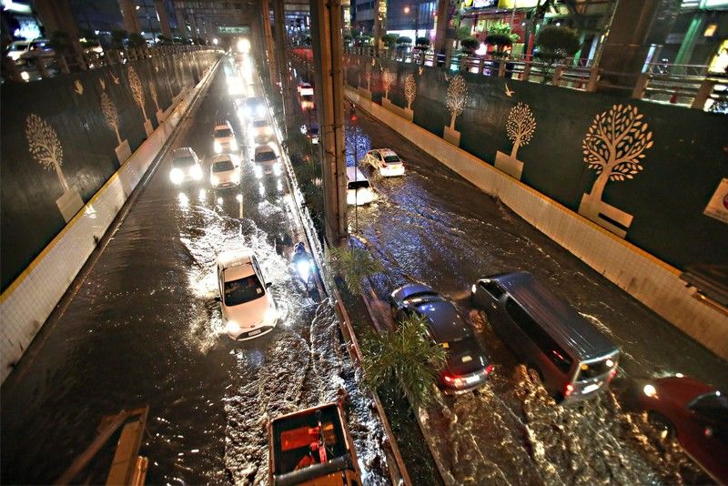 Trash, dried leaves clog drains on EDSA