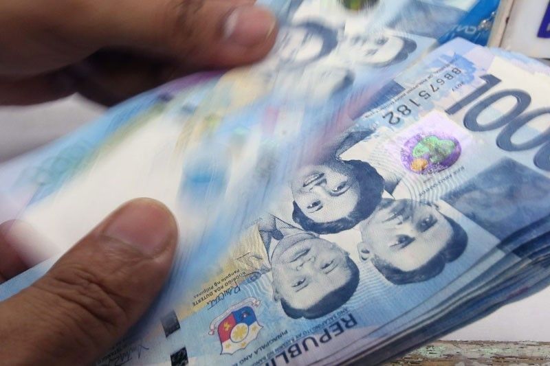 DOLE backs  14th month pay for workers