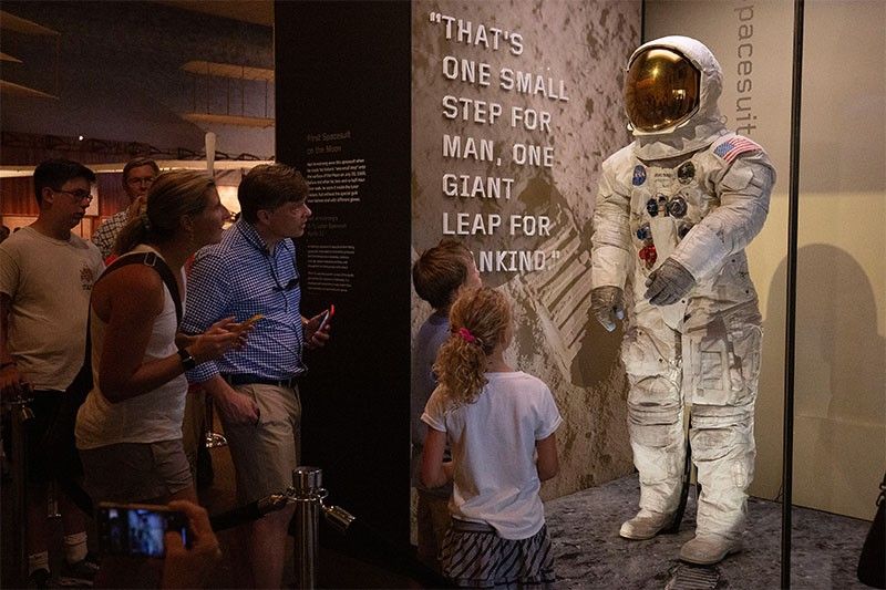 WATCH: Armstrong's spacesuit goes on display