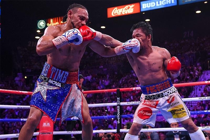 Thurman landed more punches, but Pacquiao busier overall