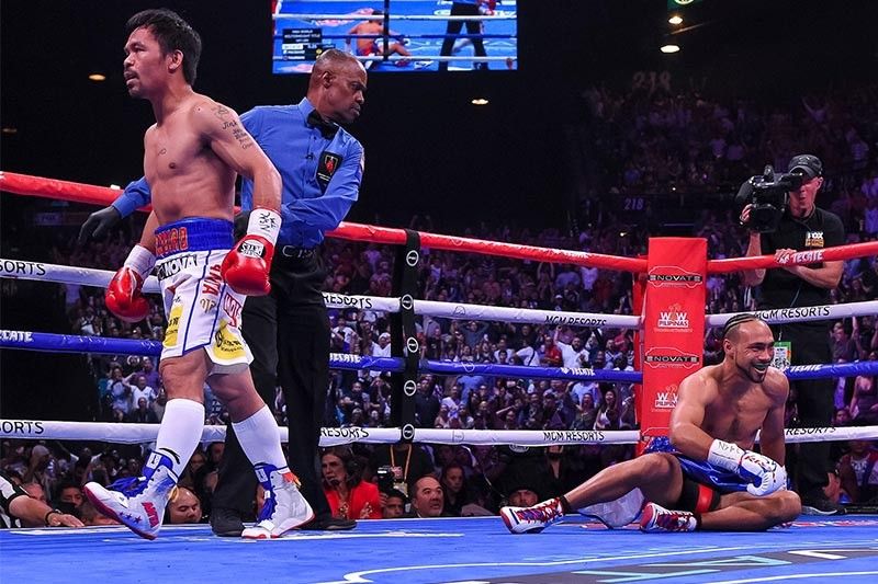 Pacquiao outpoints tough Thurman, wins split decision