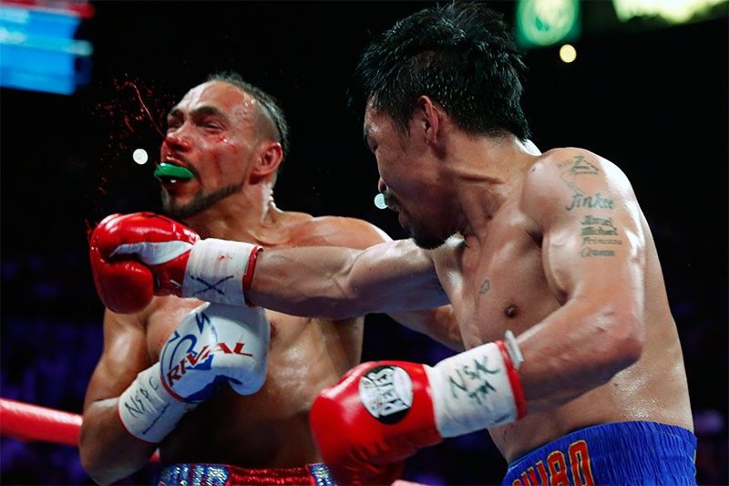 In Photos Heart Stopping Moments During Pacquiao Thurman Fight Philstar Com