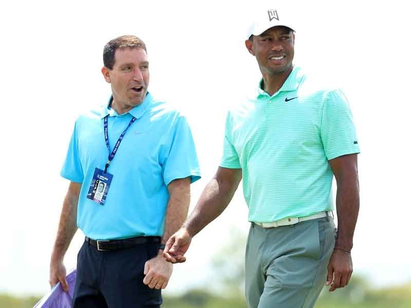 Tiger battles back stiffness as US PGA playoffs begin