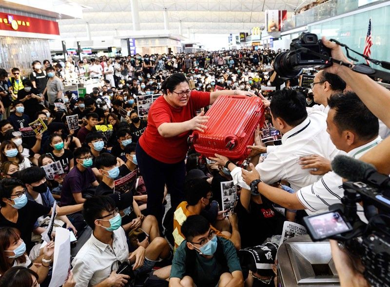Pinoys urged: Avoid HK for now