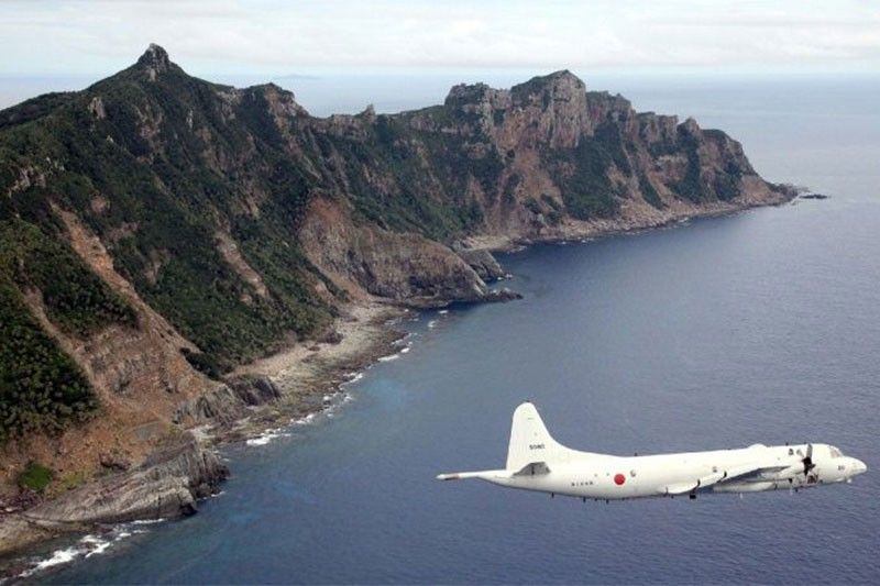 Japan 'to set up police unit' for disputed islands