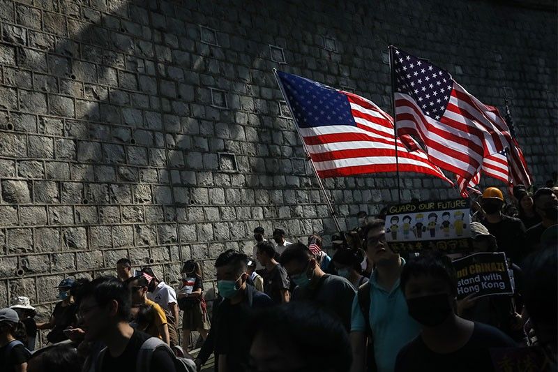 Clashes after peaceful crowd takes Hong Kong message to US consulate