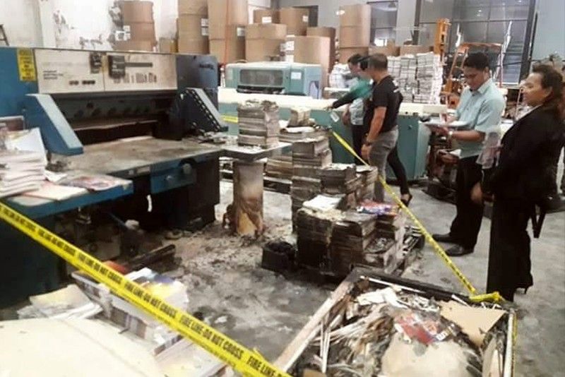 Tabloidâ��s printing press torched