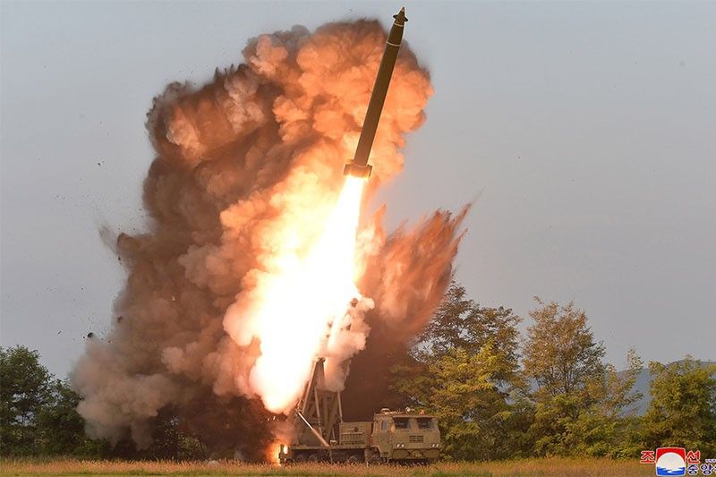 North Korea releases photos of 'super-large' rocket launcher tests ...