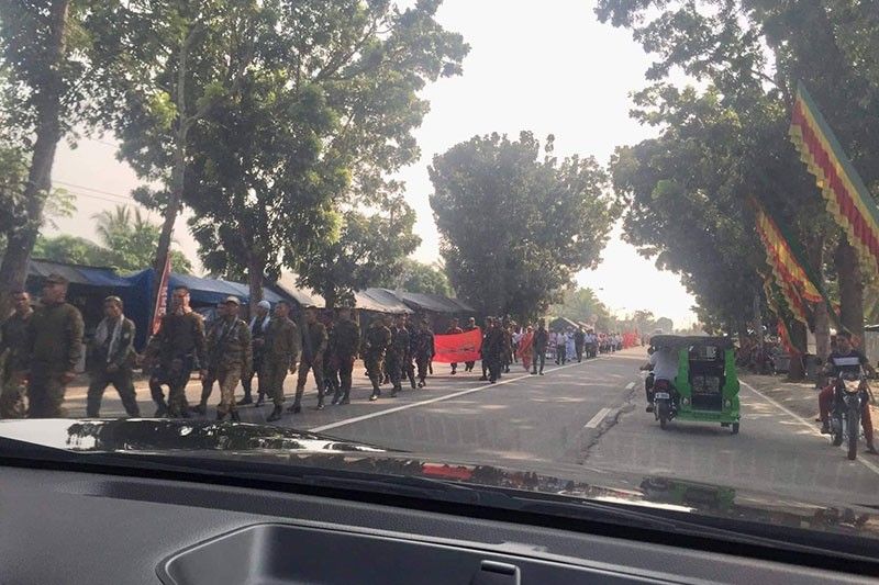 Misuari followers turn over guns brought to peace assembly without authorization