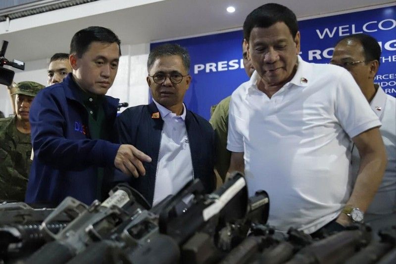 Duterte leads decommissioning of ex-NPA hitmen