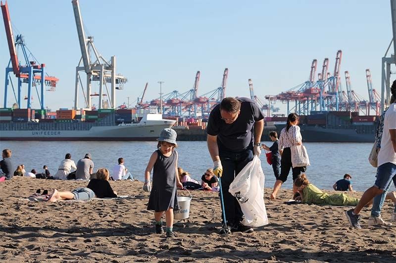 Environmental activists pluck plastic from world's beaches on mass cleanup day