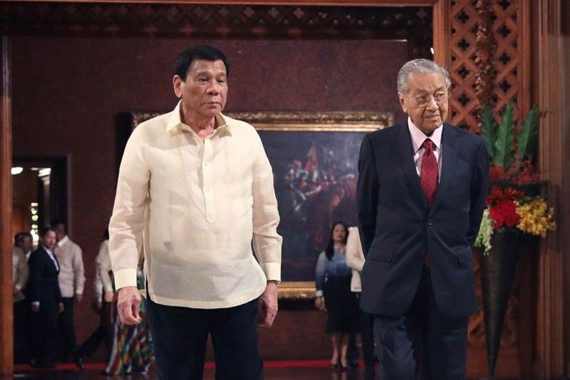 Duterte finds ally in Mahathir on non-confrontation with China