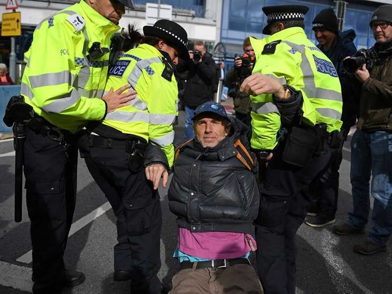 Climate protesters try to 'occupy' London City Airport