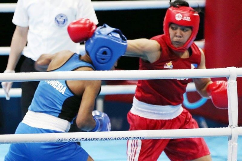 Petecio shuts out foe, guaranteed of bronze in world women's boxing tiff
