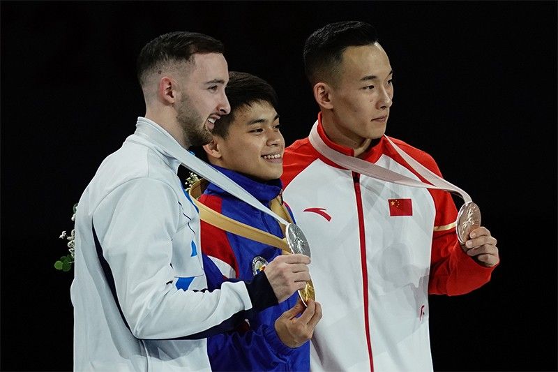 Filipino teen Yulo wins men's floor world title
