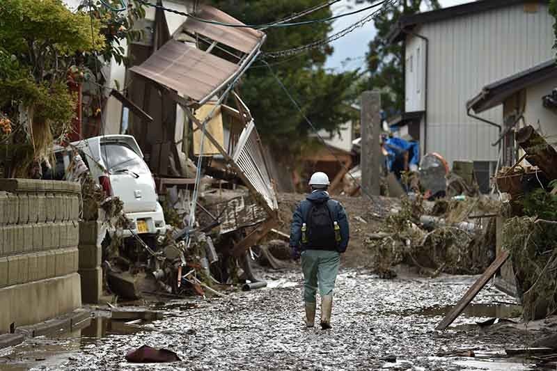 Clean-up, rescue efforts in Japan as typhoon toll nears 70