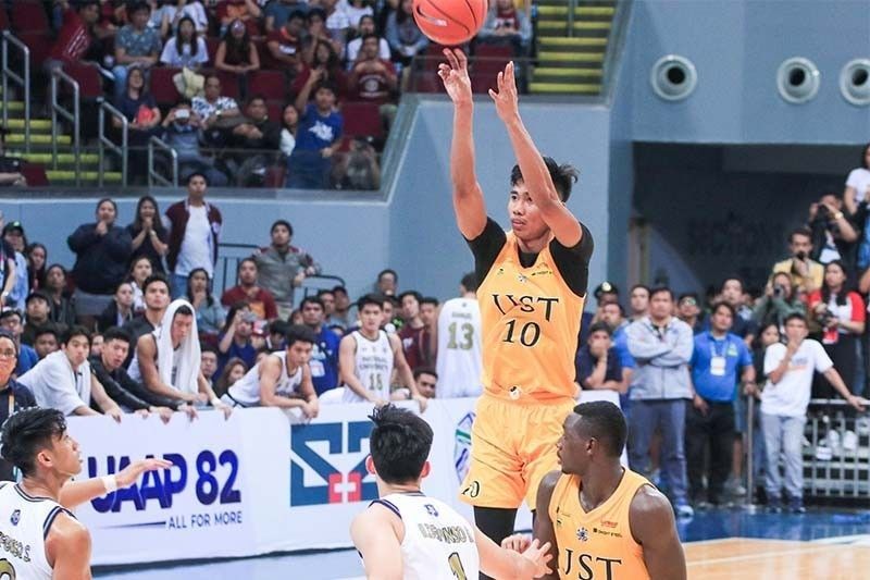 Rival UAAP school luring USTâ��s Rhenz Abando with cash, house and job for mom