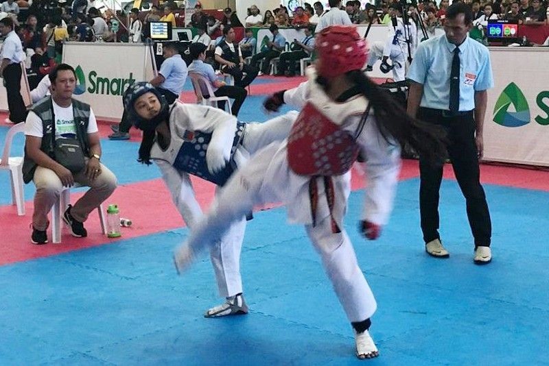 NU sinakmal ang UAAP taekwondo titles