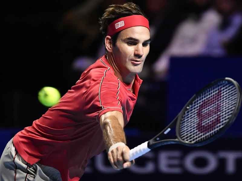 Federer celebrates 1,500th match with Basel breeze
