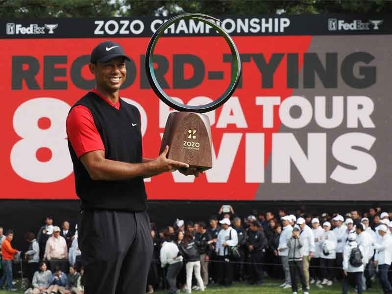 Tiger Woods secures record 82nd US PGA Tour win in Japan