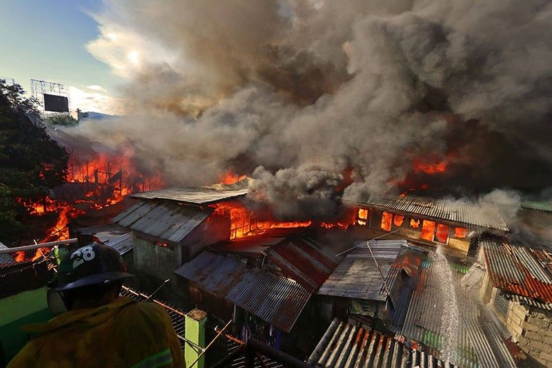 Fire hits San Roque, cebu city: 80 houses razed, 1,000 homeless