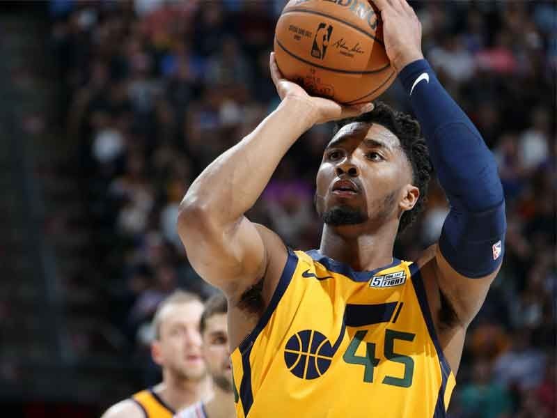 Jazz ease past Sixers