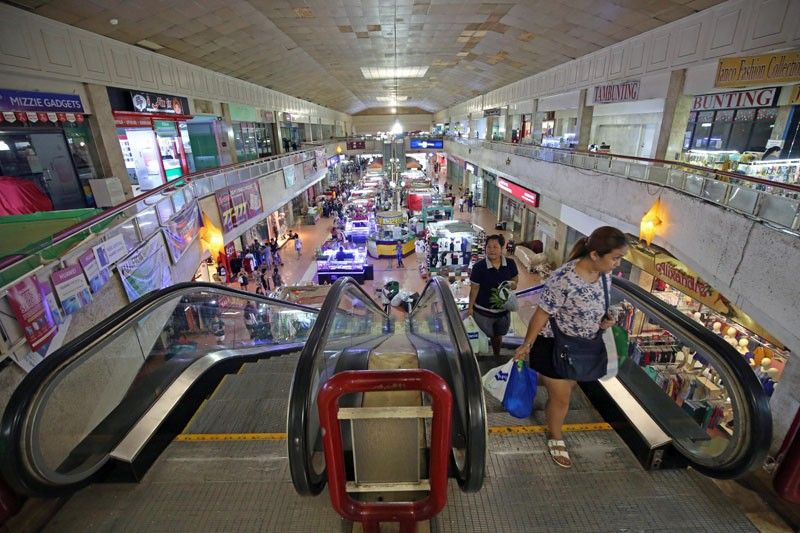 Vendors get last glimpse of iconic Manila mall