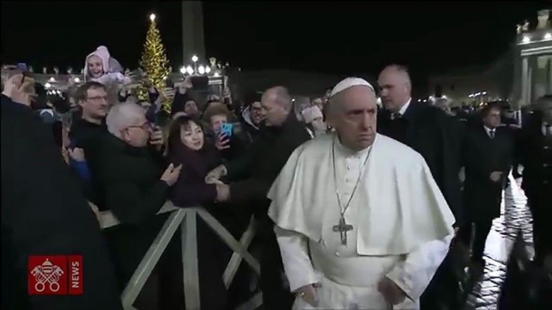 Pope's bodyguards criticized over slapping incident