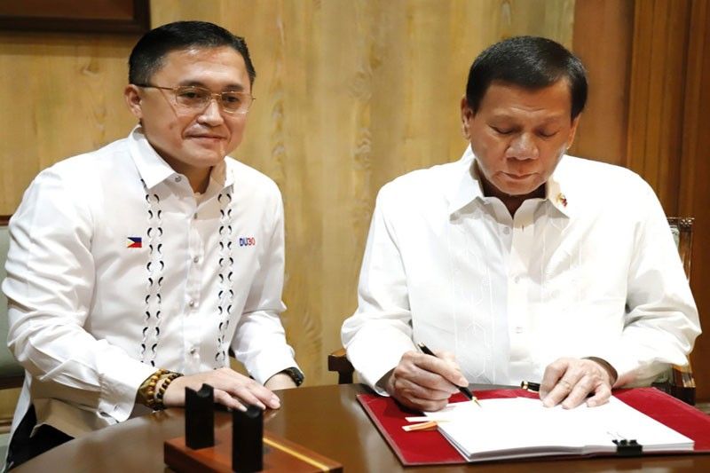 Duterte signs salary law for 1.4 million government workers