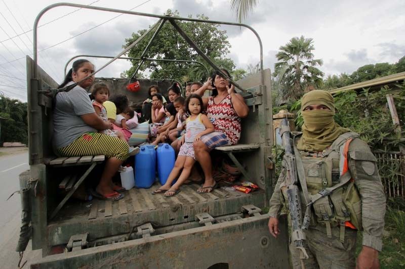 Over 50,000 now in shelters days after initial Taal ...