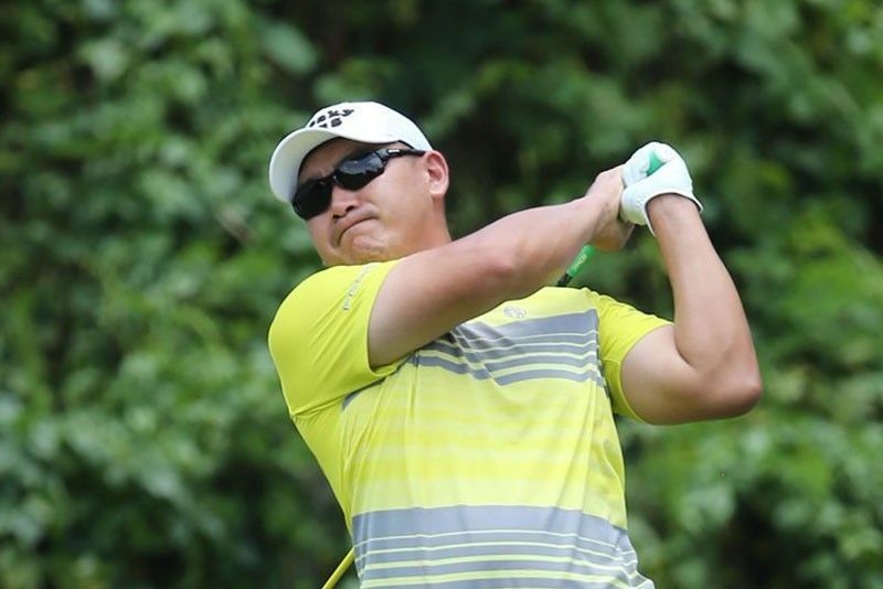 Que makes move with 67 in Singapore Open