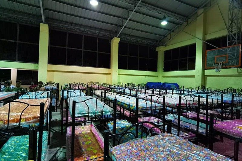 Noveleta town steps up facility for Taal evacuees with double deck beds, buffet