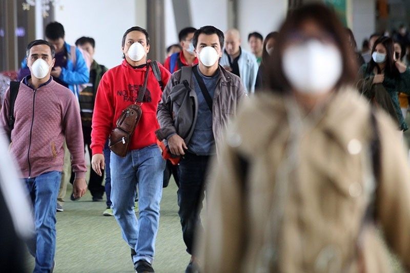 Mga pasahero sa NAIA, hinimok mag-face mask