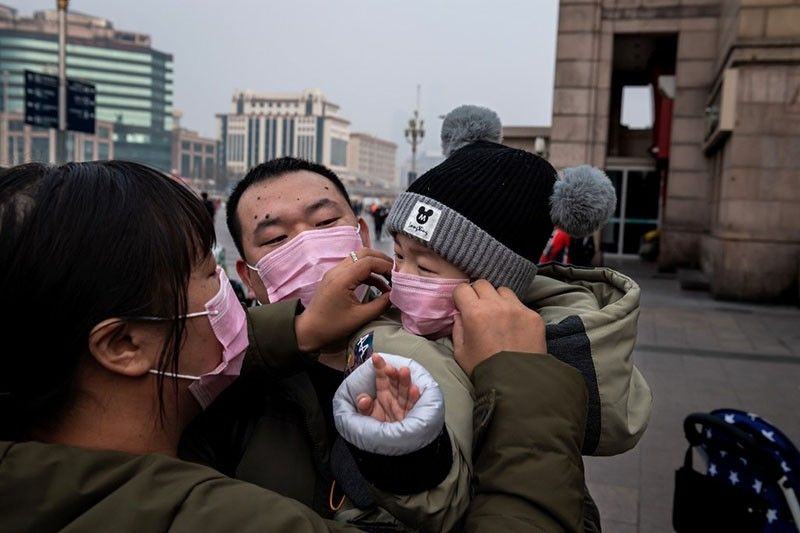 China confirms 5,974 virus cases, exceeding nation's SARS total