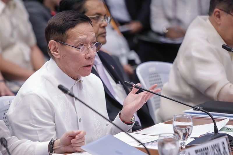 DOH chief grilled for slow contact tracing of nCov patient's co-passengers