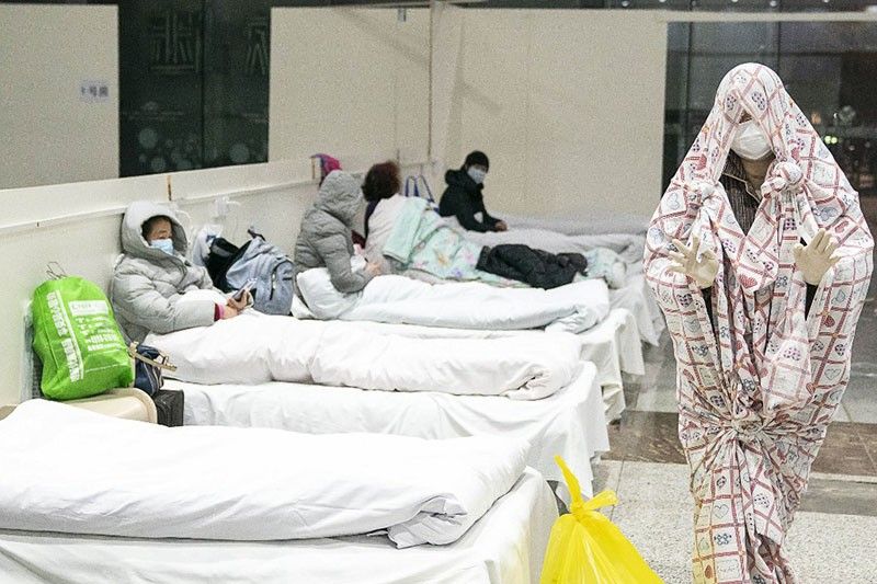China virus death toll soars to 722
