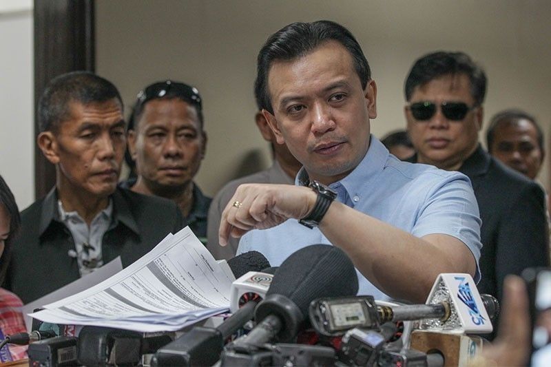 Trillanes wala sa Pilipinas habang pinaghahanap ng batas