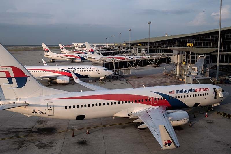 Malaysia suspected MH370 downed in murder-suicide: Aussie ex-PM