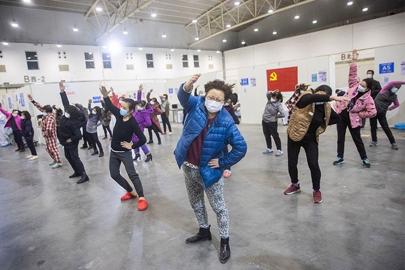 WHO urges calm as China virus death toll reaches 2,000