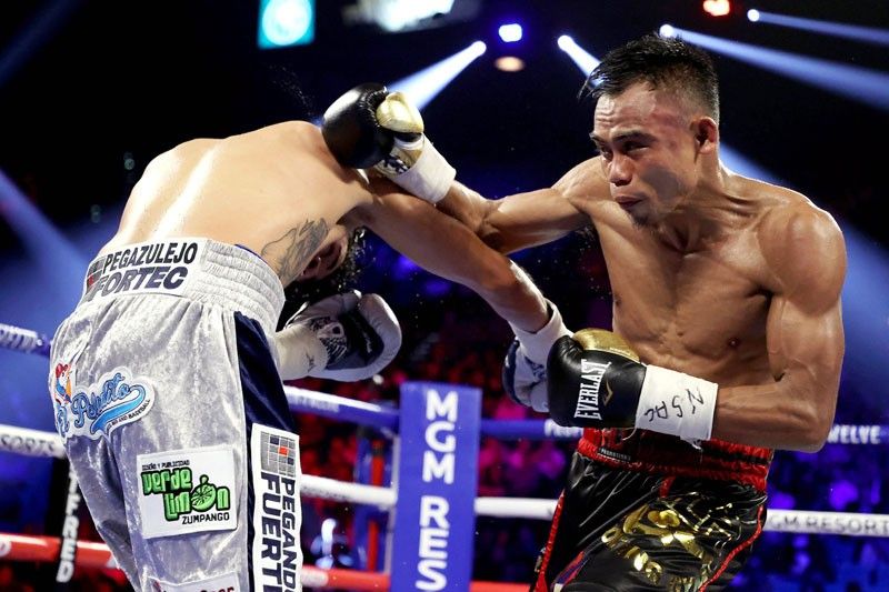 Outgunned Pinoy loses by TKO