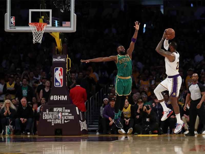 James' jump shot helps power Lakers past Celtics