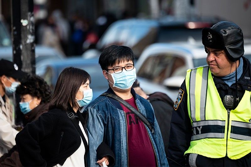 US coronavirus death toll rises as Chinese cases fall