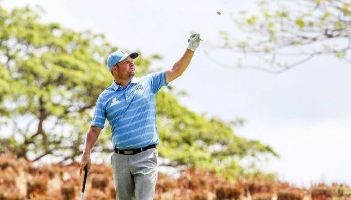 Guido tames wind for 3-stroke lead
