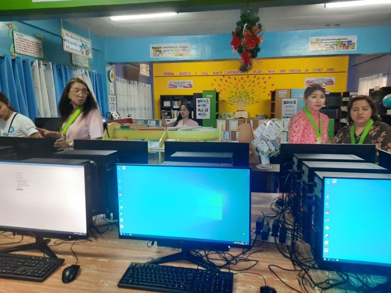 FinAsia donates computers to public schools in Pasig
