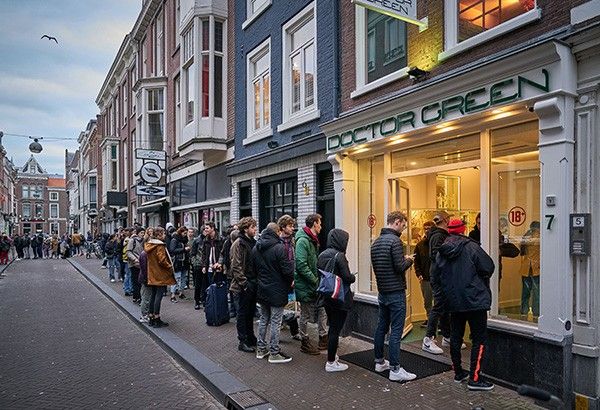 Dutch close schools, sex clubs, cannabis cafes over COVID-19